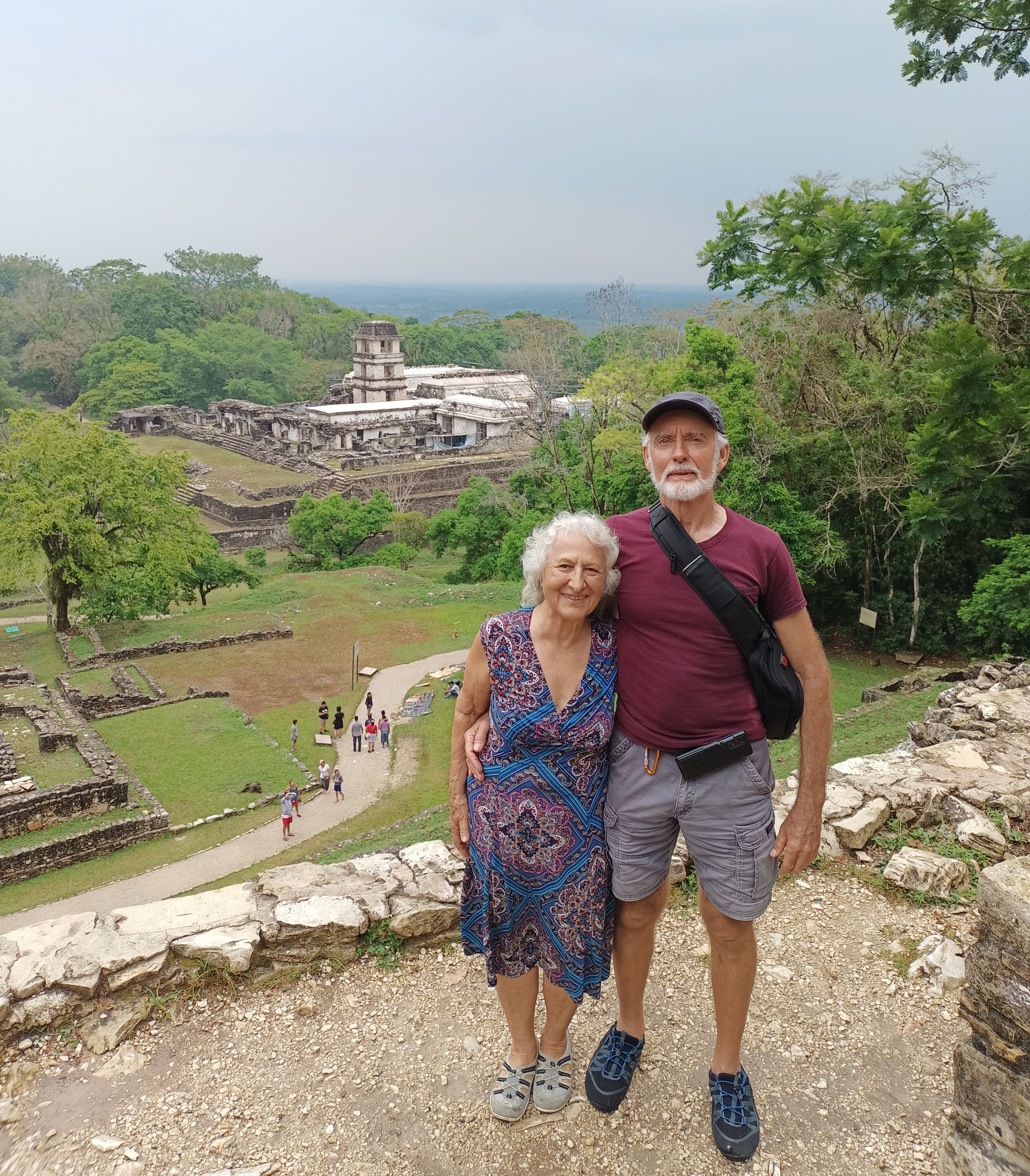 Carolyn and Robert with the observatory at Palenque in the background.