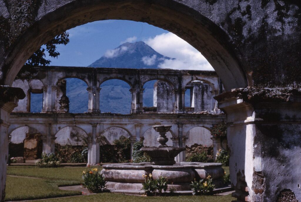 This photo from 1963 is of the Covent of Santa Clara.  You can see the brilliant sky and Volcano Agua framed in the arch.